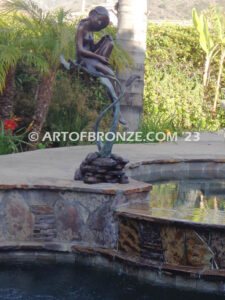 secret garden bronze statue beautiful girl gracefully resting on pampas grass leaf