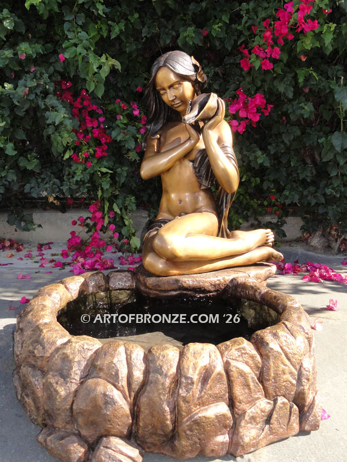 Beautiful nude woman holding shell bronze statue fountain