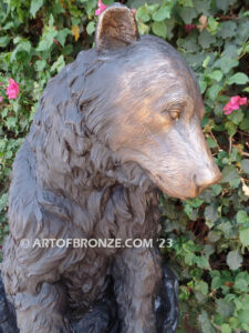 Snack Time monumental sitting outdoor bronze bear sculpture