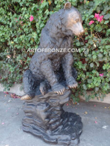 Snack Time monumental sitting outdoor bronze bear sculpture