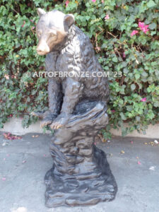 Snack Time monumental sitting outdoor bronze bear sculpture