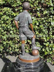 indoor gallery ayso soccer boy in uniform on marble base
