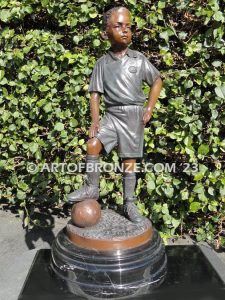 indoor gallery ayso soccer boy in uniform on marble base