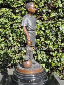 indoor gallery ayso soccer boy in uniform on marble base