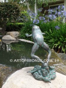 Bronze sculpture of leaping life-size frog for outdoor pond, pool or aquatic display