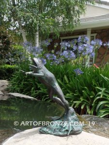 Bronze sculpture of leaping life-size frog for outdoor pond, pool or aquatic display