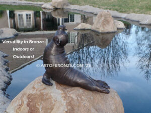 Sunbather bronze sea lion and seal mascot sculpture for zoo, university or school mascot