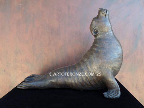 Sunbather bronze sea lion and seal mascot sculpture for zoo, university or school mascot