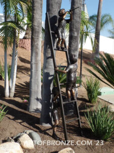 Team work bronze statue of two boys climbing on ladder for outdoor display