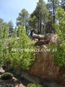 Spectacular standing elk with head turned bellowing bronze statue