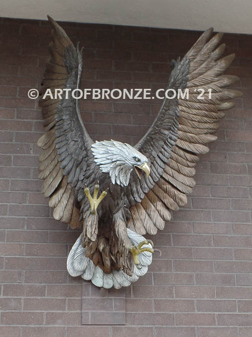 Thunder and Lightning heroic bronze eagle statue anchored to brick wall