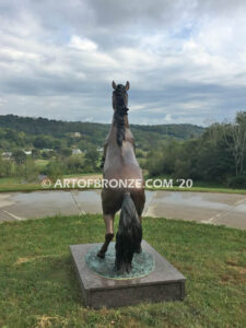 Thunderstorm bronze statue of rearing horse with forelegs off the ground and hind legs attached bronze base