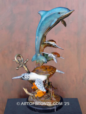 Treasure of the Sea custom bronze sculpture artwork of leaping dolphin and sea turtles