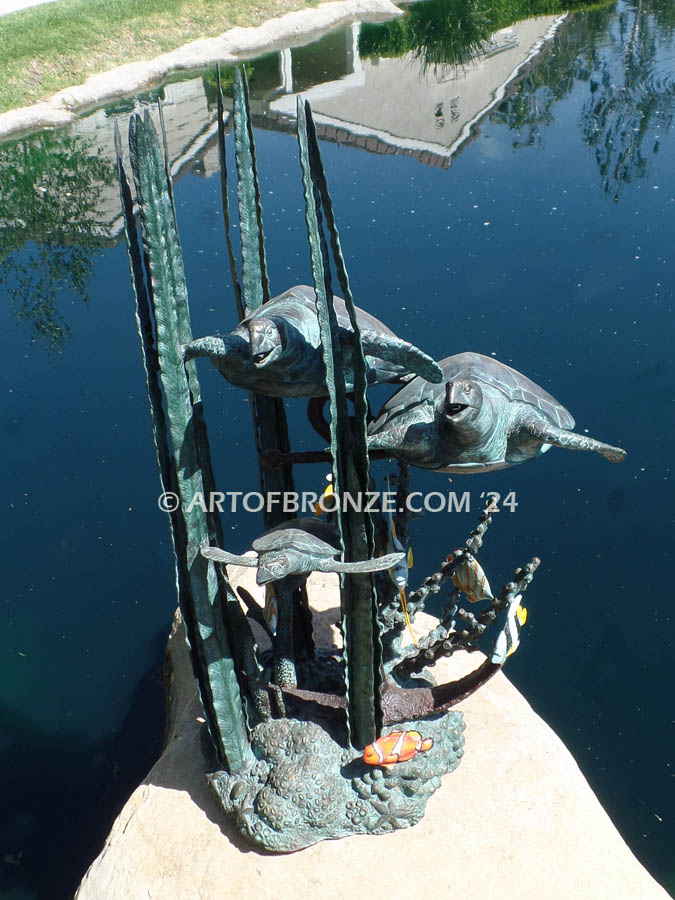 Turtle Sanctuary bronze sculpture three sea turtles swimming in kelp and coral fountain
