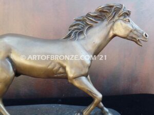 Untamed Spirit sculpture award of charging horse attached to a marble base