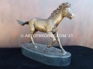 Untamed Spirit sculpture award of charging horse attached to a marble base