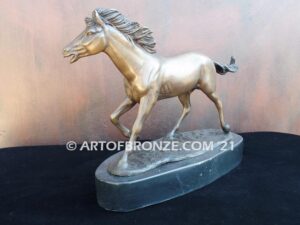 Untamed Spirit sculpture award of charging horse attached to a marble base