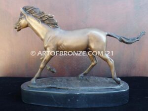 Untamed Spirit sculpture award of charging horse attached to a marble base