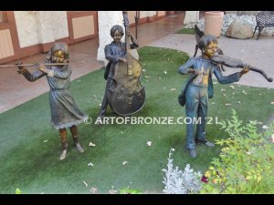 Virtuoso Pals wonderful outdoor bronze sculpture featuring three children playing music concert