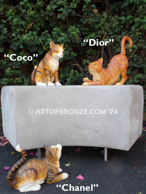 Three playing Calidy, Calico cat bronze sculptures