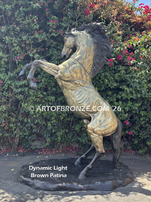 Wild Country sculpture of reared horse with forelegs off the ground and hind legs attached bronze base