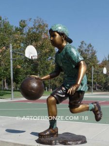 Dream Team bronze sculpture of two basketball brothers playing together for outdoor display