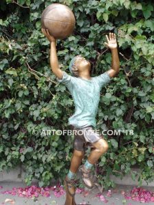 Dream Team bronze sculpture of two basketball brothers playing together for outdoor display