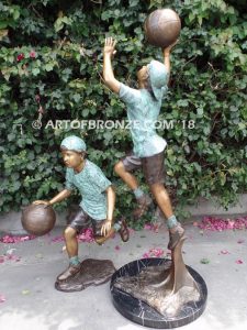 Dream Team bronze sculpture of two basketball brothers playing together for outdoor display