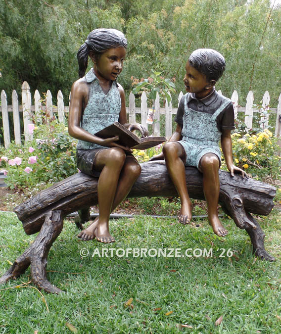 Favorite Teacher Large Bronze Sculpture of boy and girl kids reading book