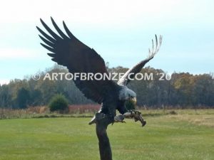 Eagle Sanctuary bronze sculpture of bald eagles catching fish in talons