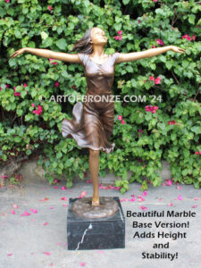 Wind Swept bronze sculpture joyous woman gracefully balancing on one foot