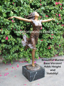 Wind Swept bronze sculpture joyous woman gracefully balancing on one foot