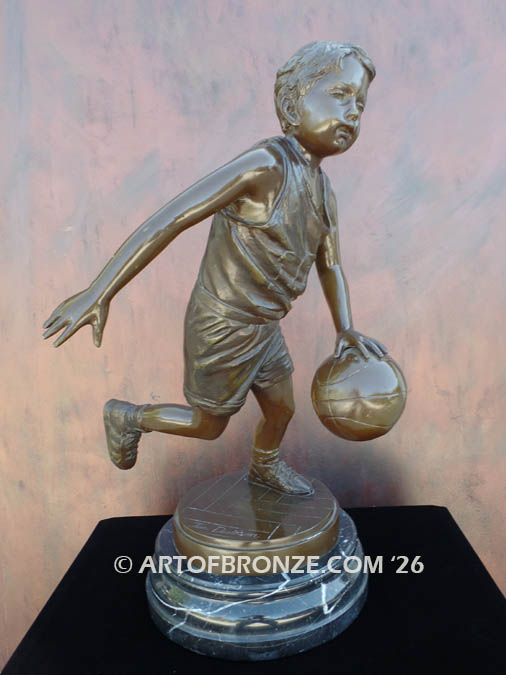 Break Away bronze statue of basketball player dribbling ball and running
