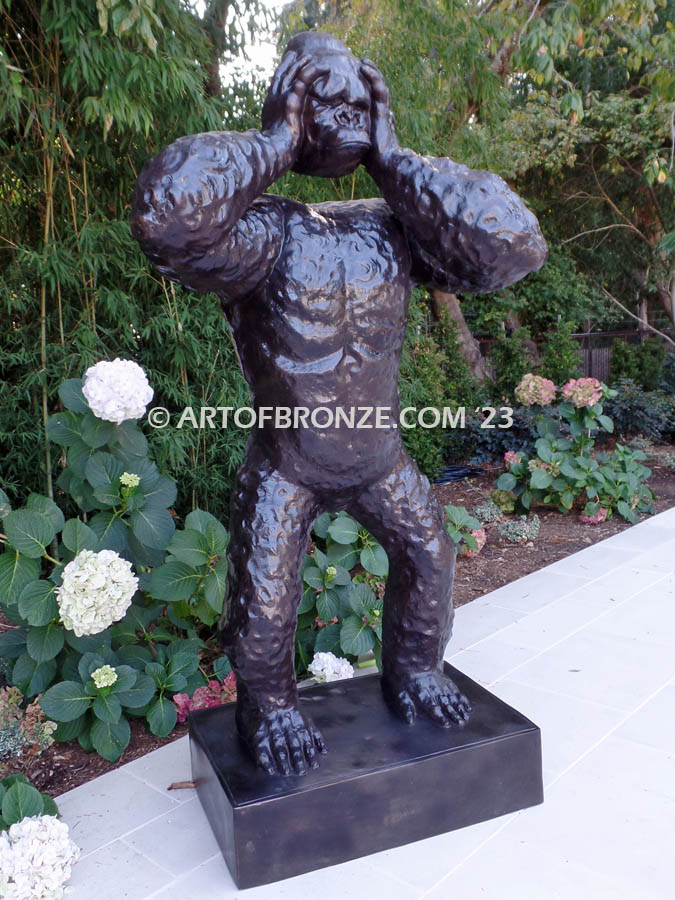 Gorilla Out of Body modern art bronze sculpture of standing ape with uplifted head from body