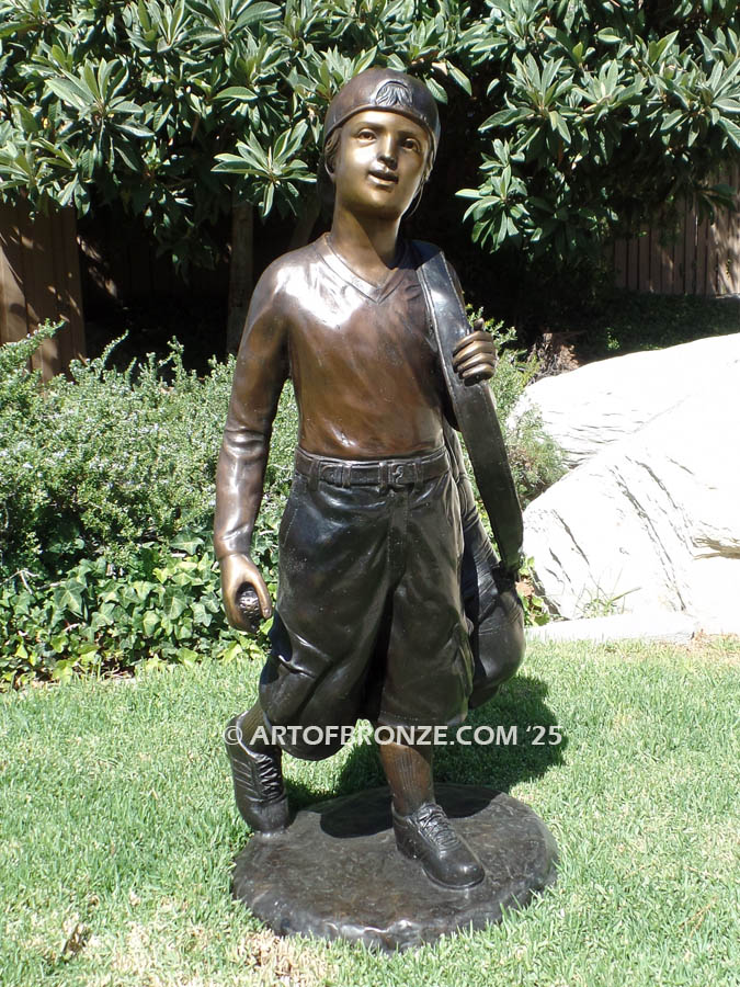 Practice makes Perfect bronze statue of junior golfer practicing for USPGA