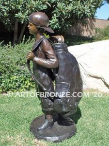 Practice makes Perfect bronze sculpture of junior golfer practicing for USPGA