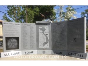 Vietnam War Memorial outdoor monumental statue of an eagle landing atop granite pillar