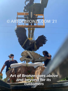 Thunder and Lightning monumental bronze eagle statue anchored a top a massive tree