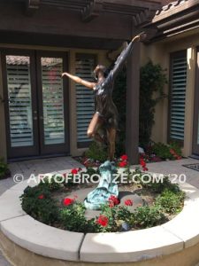 Harmony Light the art of dance and ballet bronze sculpture showing leaping ballerina