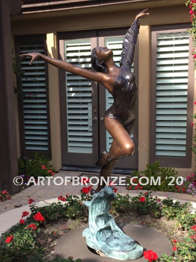 Harmony Light the art of dance and ballet bronze sculpture showing leaping ballerina