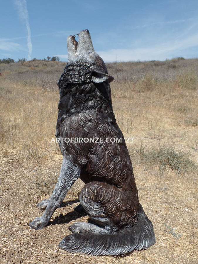 Timber Wolf bronze sitting wolf statue howling at the moon