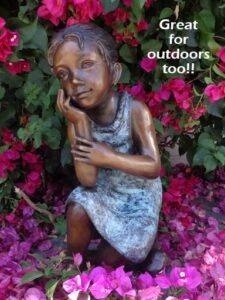 Cutie Pie bronze sculpture of girl sitting down and daydreaming
