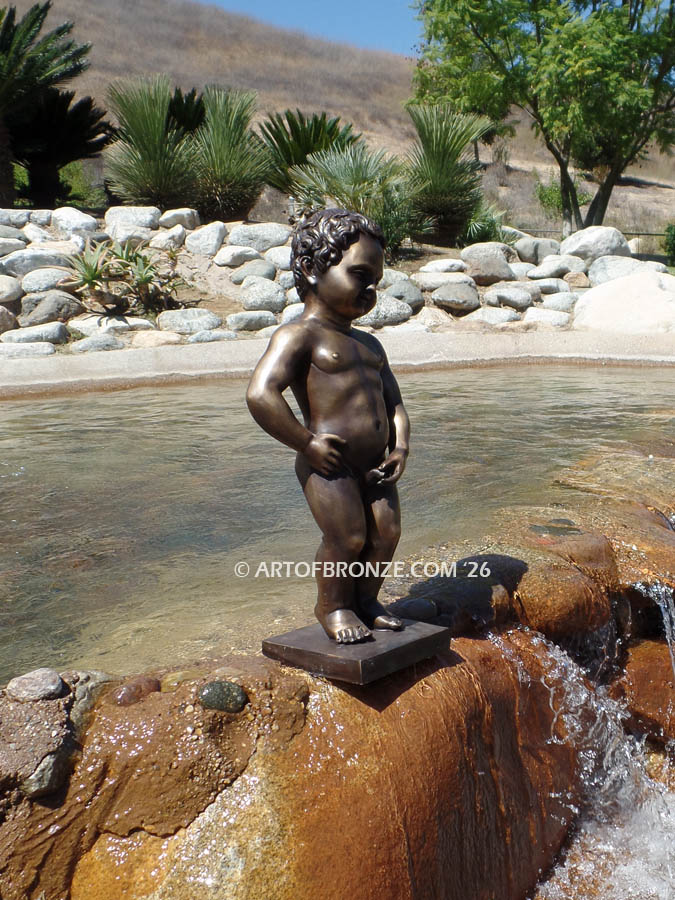 Manneken Pis 17th century bronze sculpture of naked little boy peeing into fountain