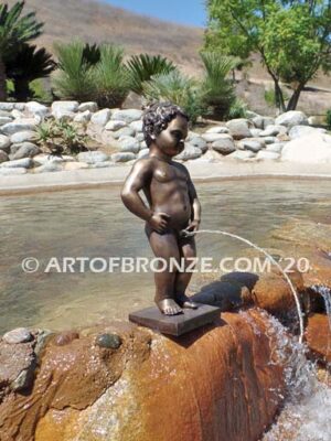 Manneken Pis 17th century bronze sculpture of naked little boy peeing into fountain