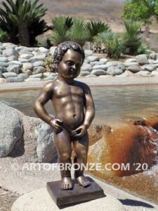 Manneken Pis 17th century bronze sculpture of naked little boy peeing into fountain