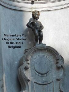 Manneken Pis 17th century bronze sculpture of naked little boy peeing into fountain