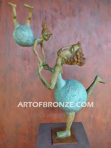 Maternidad bronze gallery sculpture of mother swinging daughter on steel pedestal
