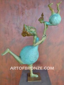 Maternidad bronze gallery sculpture of mother swinging daughter on steel pedestal