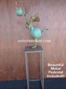 Maternidad bronze gallery sculpture of mother swinging daughter on steel pedestal