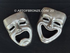 Comedy and Tragedy bronze laughing and crying masks wall artwork symbol for the theater